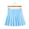 Falda corta estilo coreano falda plisada línea A falda corta de cintura alta para mujer falda plisada de color liso estilo universitario especificaciones al por mayor