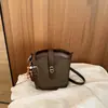 Bolso Cubo Retro de Bloques de Color de Moda con Cierre de Giro para Mujer 2026 Nueva Moda de Otoño Bolso Cruzado de Hombro Único de Parche de Nicho