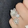 Anillo Versa Glf Serie Mundo de Flores para Mujer Baño de Oro 18K Circonio Brillante Multifacético Moda Anillo de Lujo Ligero