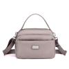 Nova bolsa carteiro portátil leve feminina para uso externo, no trajeto e casual, grande capacidade, múltiplos compartimentos, bolsa de ombro feminina