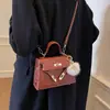 Bolso de mujer personalizado, bolso de hombro versátil para mujer con estampado de piedra, nuevo bolso de mano de moda de invierno, bolso Kelly retro a la moda