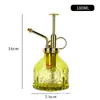 Al por mayor Nuevo Riego Retro Estampado Girasol Vitral Pequeña Regadera Presión Jardinería Tetera de Riego para Uso en Casa