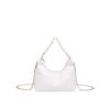 Bolsa Bolsa de pérola de alta qualidade feminina 2024 Nova corrente Bolsa de ombro Textura PU Cor sólida Crossbody Bolsa