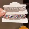 Pulsera tejida multicapa con incrustaciones de diamantes de estilo francés de lujo ligero con un diseño único, pulsera de nicho con una sensación de lujo ligero y alta gama, accesorio de mano versátil para mujer
