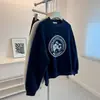 Otoño e invierno estampado pequeño letra casual cuello redondo sudadera mujer estilo universitario perezoso versátil caída sal top tendencia