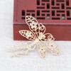 Yiwu color rayo dorado cobre chapado en oro DIY libélula hueca un par de horquillas accesorios para el cabello accesorios para el cabello antiguos B3319