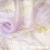 Diseño original tela Hanfu dorado estilo japonés malla hilo ligero nube auspiciosa grulla peonía tela de falda dorada