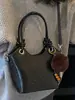 Bolso bandolera tipo cubo retro simple de moda coreana Bolso de hombro de moda nuevo Invierno 2025 Bolso cruzado de nicho para mujer