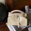 Diseño Nicho Piel de Vaca Francesa Bolsa de Almohada Portátil 2025 Nuevo Retro Simple Bandolera Commuter Hombro Bolsa de Médico