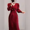 Comércio Exterior Roupas Femininas Outono/Inverno 2025 Vestido de Tricô Feminino Gola V Manga Bufante Cinto Acinturado Fenda Saia Longa Exibição Elegante