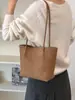 Elegante bolsa de balde com padrão trançado para mulheres, novo modelo 2026, grande capacidade, bolsa de mão fashion, bolsa versátil para o dia a dia.
