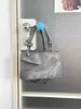 Celebridade da internet moda personalidade simples bolsa pequena feminina 2025 primavera nova versátil bolsa de ombro crossbody ins bolsa quadrada pequena