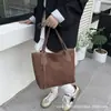 Bolso de Hombro Simple de Gama Alta Transfronterizo Estilo Europeo y Americano para Mujer 2026 Nuevo Bolso Cubo Casual Retro de Gran Capacidad Moderno Versátil
