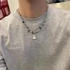 Collar de cadena metálica de puntada de cadeneta de monstruo fantasma pequeño blanco y negro para hombre y mujer, sentido de alta gama, nicho, personalidad, temperamento, cadena para clavícula