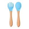 Vajilla de alimentación para niños de grado alimenticio Cuchara para comer bebé Tenedor Silicona Tazón Cuchara Tenedor de silicona para niños Cuchara con mango de madera