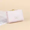 Cartera plegable linda de dibujos animados transfronteriza con lazo, tarjetero de macarrón, cartera integrada de piel sintética para mujer, personalizable