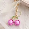 Llavero Creativo Nuevo Exquisito Brillante de Resina de Cereza Transfronterizo Colgante para Bolso de Mujer Colgante para Llavero de Coche