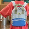 Nova mochila infantil estilo coreano com color-blocking de cores dopamina, mini mochila escolar multifuncional de color-blocking com letras de nicho