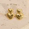 Pendientes Dorados en Forma de Corazón Estilo Europeo y Americano, Pendientes de Botón de Alta Gama para Mujer, Pendientes de Acero Inoxidable de Lujo Ligero, Personalización Profesional de Joyería