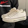Tenis blancos para hombre de arrastre, nuevos zapatos de lona de primavera 2026, zapatillas casuales de entrenamiento alemanas, tenis deportivos para hombre