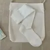Nueva colección de principios de otoño de 2026: calcetines de algodón para mujer de color liso avena, transpirables, estilo coreano y de longitud media hasta la pantorrilla