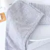 Touca Seca para Cabelo de Carvão de Bambu Cinza Atacado Macia Absorvente Touca de Banho Simples com Botão Uso Diário em Casa Toalha para Cabelo Seco