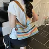Bolso de axila tejido con paja más vendido transfronterizo, bolso de hombro estilo vacacional, bolso de mujer de moda a rayas bohemio, al por mayor