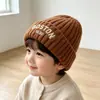 Gorro de punto protector para orejas de niño, estilo coreano, cálido, unisex, a prueba de viento para invierno, versátil, gorro de lana para bebé para poner