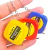 Cinta Métrica de 1M Mini Regla para Medir Ropa Regla de Costura Doméstica con Llavero Regla Pequeña de Acero de 1m Regla Medidora Metro Regla