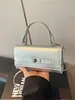 Bolso Kelly de Moda Estilo Chanel, Nuevo Bolso de Hombro y Cruzado para Mujer con Patrón de Cocodrilo Transfronterizo, Bolso de Mano Cuadrado Pequeño para Viajes de Negocios para Mujer
