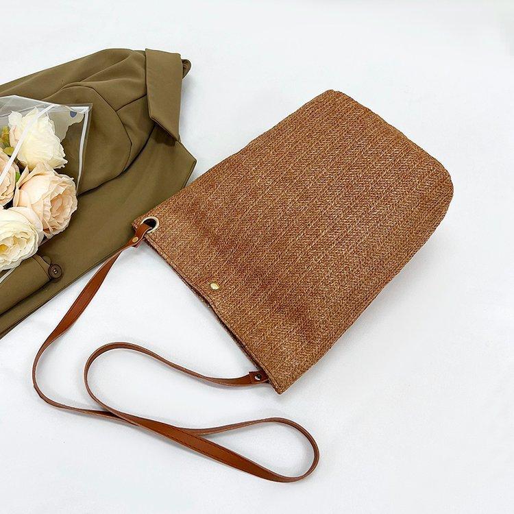 编织包女包新款潮2024夏草编简约百搭小清新水桶包个性单肩斜