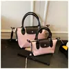 Bolsa Longxiang Popular Europeia e Americana Bolsa Feminina Mini de Mão com Padrão Bolsa de Mão Fashion Versátil Bolsa de Ombro Transversal