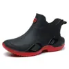 Botas de lluvia nuevas transfronterizas moda para hombre y mujer zapatos de agua botas de lluvia cortas zapatos de agua antideslizantes zapatos de goma bajos forrados de polar para parejas venta al por mayor