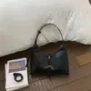 Bolso de Axila 2026 Estilo Nuevo Simple para Viajes Diarios Bolso Dumpling de Moda Versátil Bolso de Mano Bolso de Hombro de Gama Alta de Nicho para Mujeres