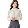 Tiro real alta calidad camisa de gasa de manga larga color albaricoque francés para mujer chic suelta diseño que cubre el abdomen sentido de diseño top de nicho