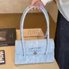 Nova Bolsa de Ombro Feminina Primavera 2026 Estilo Puro Bolsa de Axila Bolsa de Mão Tendência Fresca Pequena Bolsa Quadrada para Mulheres