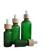 Botella de vidrio esmerilado color té para aceite esencial, tapa de madera de bambú, botella con gotero, submuestra de cosméticos, botella de vidrio, botella para dilución de aceite esencial, venta al por mayor