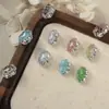 Decoraciones de arte para uñas de cristal de hielo triturado de alta calidad sin base, producto terminado de cristal con acabado de grieta de hielo brillante de color sólido, pedrería para uñas vestible