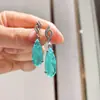 2023 Conjunto de Joyería de Colgante y Pendientes de Imitación Paraíba Estilo Europeo y Americano Colgante de Gota Pendientes para Mujer