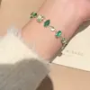 Pulsera geométrica de circón verde fresca y vibrante estilo bosque Primavera y Verano iluminadora de piel con faldas joyería de mano de alta gama a la moda