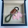 Dinero en el Caballo Cuero de Vaca Creativo Exquisito Casual Regalo de Pareja Bolso Lindo Colgante Llavero de Coche Llavero