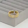 Nuevo Estilo Chapado en Cobre Oro Real Microincrustado Circonita Anillo Abierto de Moda para Mujeres de Alto Nivel Elegante Temperamento Anillo de Dedo Versátil