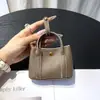 Bolso de mano mini lindo para mujer de piel de vaca de primera capa, bolso pequeño con colgante, bolsa para guardar auriculares y llaves, tarjetero, monedero de cuero genuino