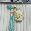 Nuevo Modelo Oro Puro 999 Oro Atrae Fortuna Flor Dinero Llavero Cordón de Cuero Cadena para Teléfono Colgante Decoración de Bolso Regalo