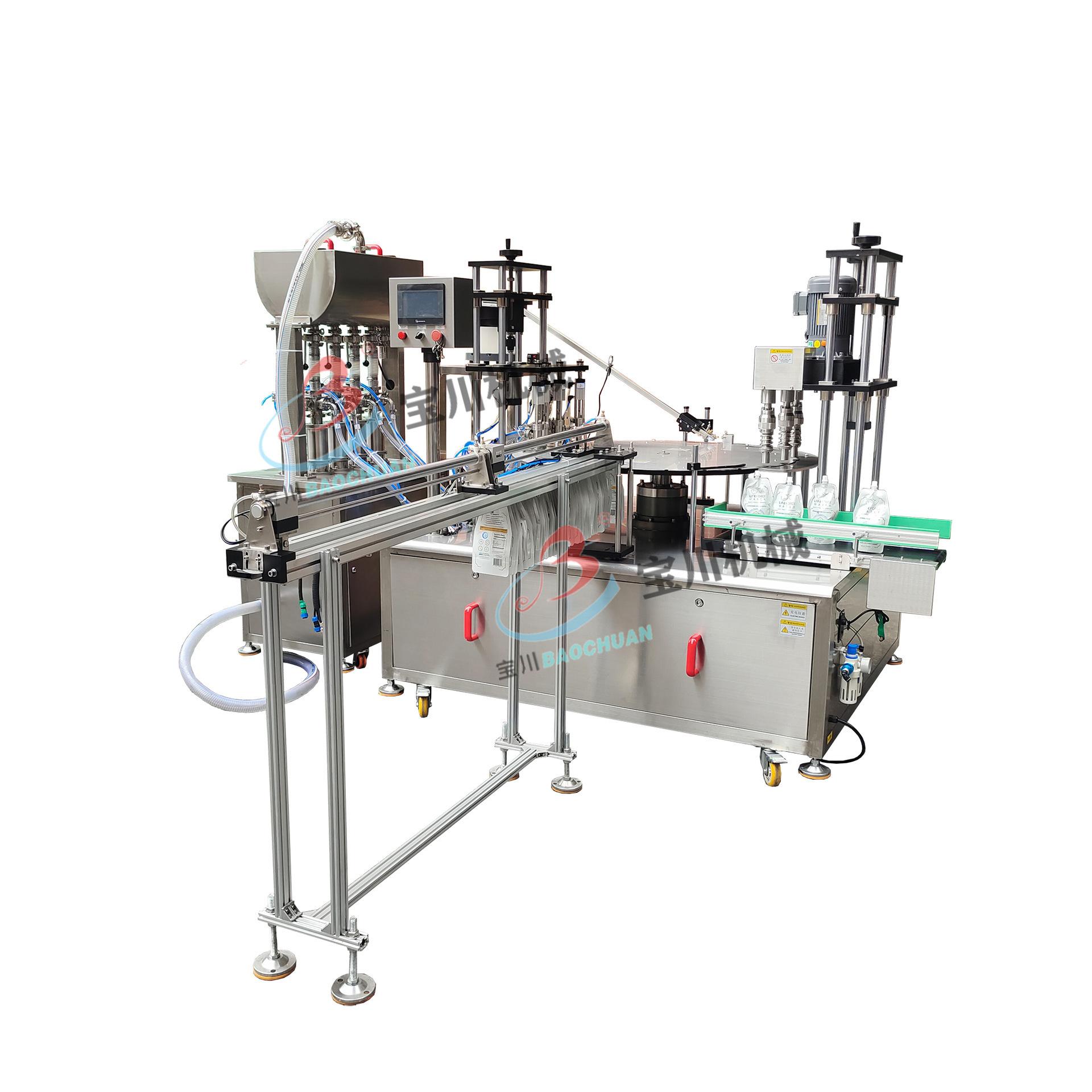 全自动吸嘴袋四头灌装旋盖机白底图-恢复的