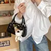 Moda Primaveral 2026 Bolso de Bolos Moderno con Textura Única, Lindo y Fresco Bolso Pequeño Cruzado con Lazo en Forma de Corazón