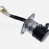 La válvula solenoide de 12V 16271-60010 es adecuada para cortacéspedes de giro cero Kubota ZD25F ZD28 ZD28F