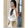 Shorts de Mezclilla Color Caqui para Mujer 2026 Nuevo Verano Cintura Alta Ajustados Estilo Americano Chica Caliente Ceñidos al Cuerpo Adelgazantes de Línea A Pantalones Cortos