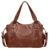 Bolsa tote retrô europeia e americana, nova bolsa grande de alta capacidade para o dia a dia da mulher, bolsa de ombro versátil, bolsa transversal de moto moderna e versátil