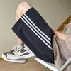 Shorts Masculinos de Verão Finos de Seda Gelo de Secagem Rápida Americanos Retrô High Street Modernos Esportivos Listrados de Comprimento Médio